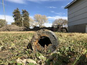 image of sludge filled/corroded pipes